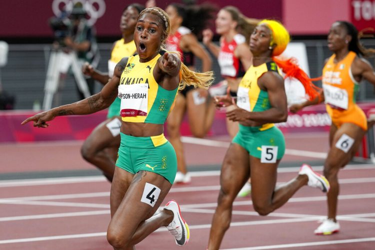 Thompson-Herah breaks Flo Jo's Olympic record in women's 100